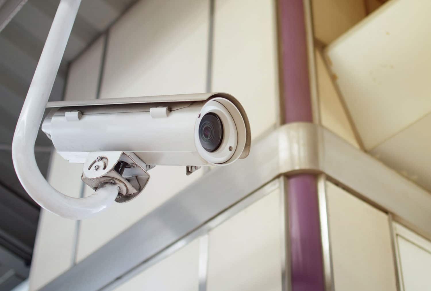 Retail CCTV security camera mounted on a ceiling